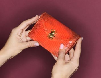 Oranje portemonnee in guava hagedis Alex Claris Virot