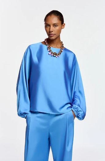 Blauwe bloes met vleermuismouwen Flagrant Essentiel