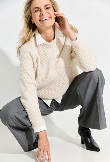 Beige pull met motief Gerione Antonelli