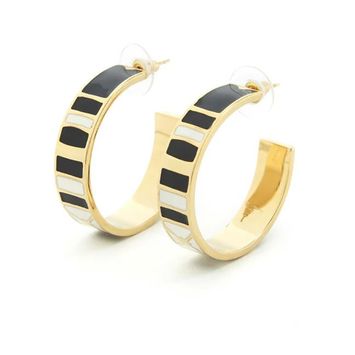 Zwart met gouden oorbellen Hoop Draeger 