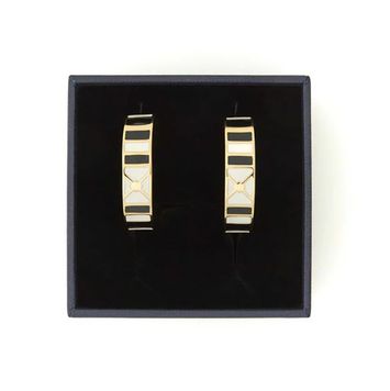 Zwart met gouden oorbellen Hoop Draeger 