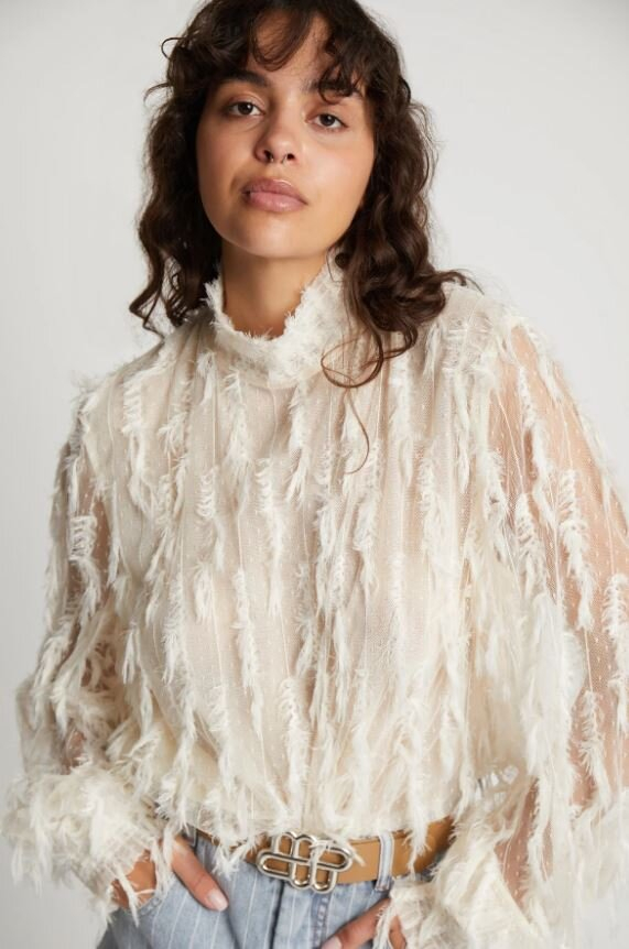 Creme kleurige doorzichtige bloes met franjes Skallo Munthe