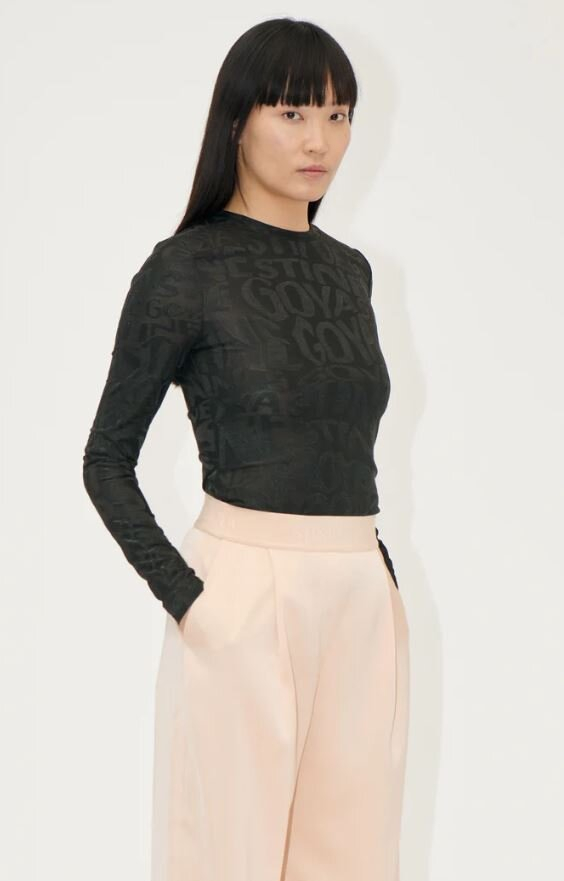 Zwarte doorzichtige t-shirt met tekst  Stine Goya