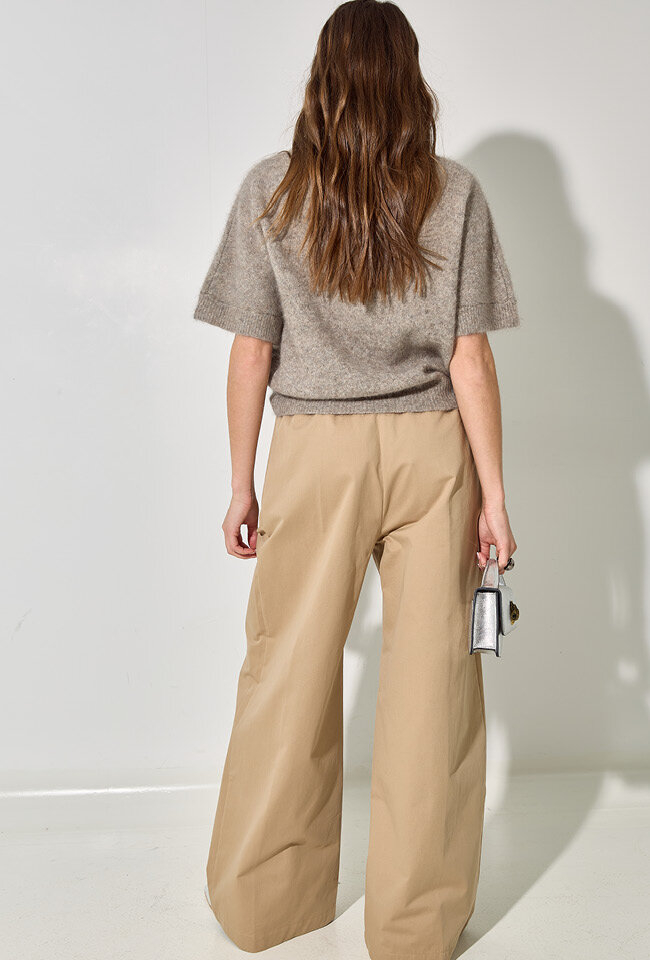 Beige wijdvallende broek met bandplooi en eleastiek Semicouture