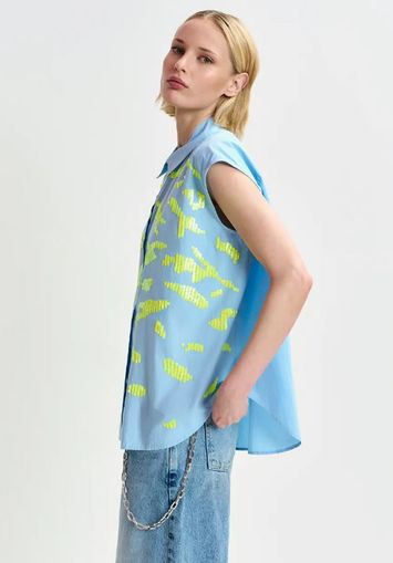 Lichtblauw en fluo geel mouwloos overhemd met pailletten Hixie Essentiel