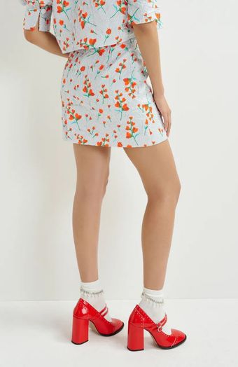 Witte minirok met bloemenprint Husan Essentiel 
