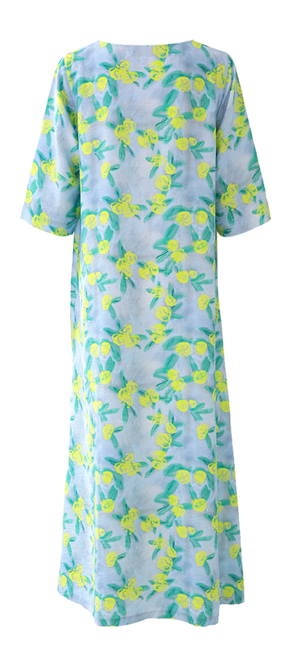 Blauwe lange wijde jurk met bloemenprint Francine Nathalie Vleeschouwer 