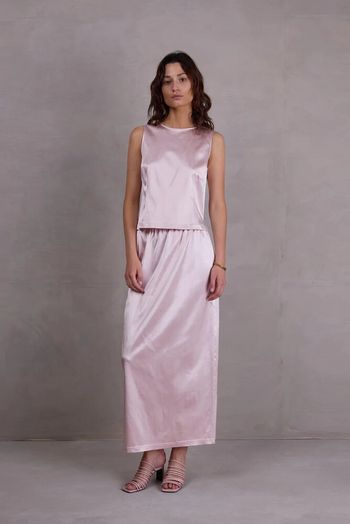 Roze glanzende jurk Fazil Nathalie Vleeschouwer 