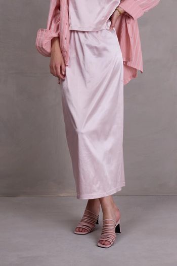 Roze glanzende jurk Fazil Nathalie Vleeschouwer 