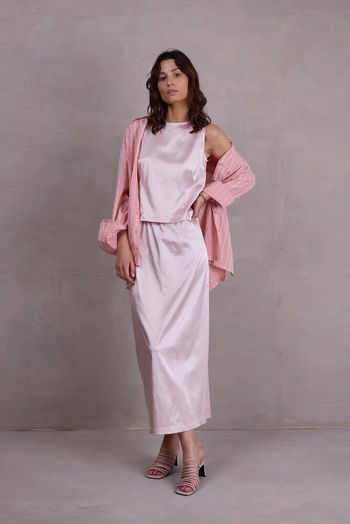 Roze glanzende jurk Fazil Nathalie Vleeschouwer 