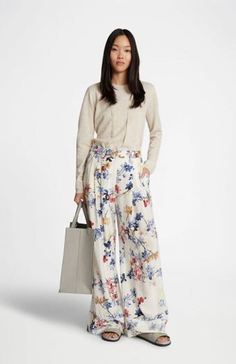 Beige lange broek met bloemenprint Faicus Munthe 