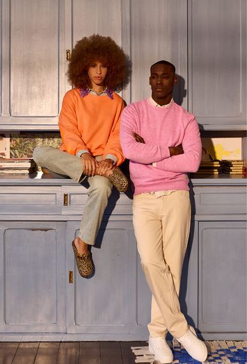Oranje kleurige oversized sweater met opschrift op de achterkant Sky Paradise Liv Bergen