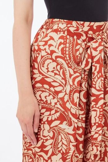 Roestkleurige wijde broek met bloemenprint en overslag Liu Jo 