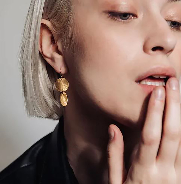 Gouden oorbellen Psy Laurence Delvallez