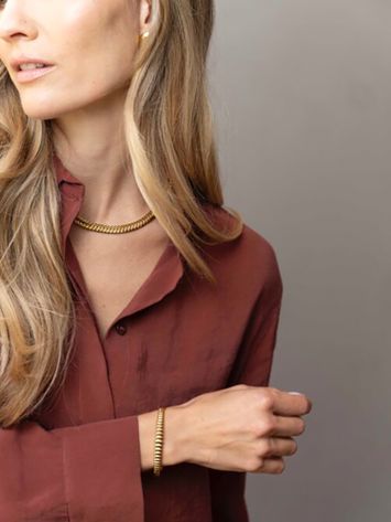 Gouden geribbelde bangle Ellen Beekmans 