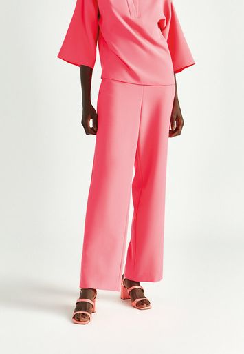 Fluo roze soepelvallende broek met elastiek Phocas Xandres