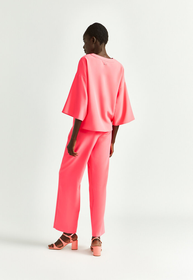Fluo roze soepelvallende broek met elastiek Phocas Xandres