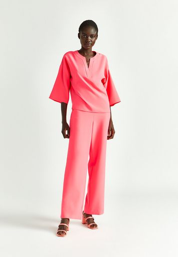 Fluo roze soepelvallende broek met elastiek Phocas Xandres