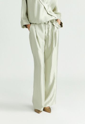 Taupe kleurige glanzende wijde broek met bandplooi Parmis Xandres