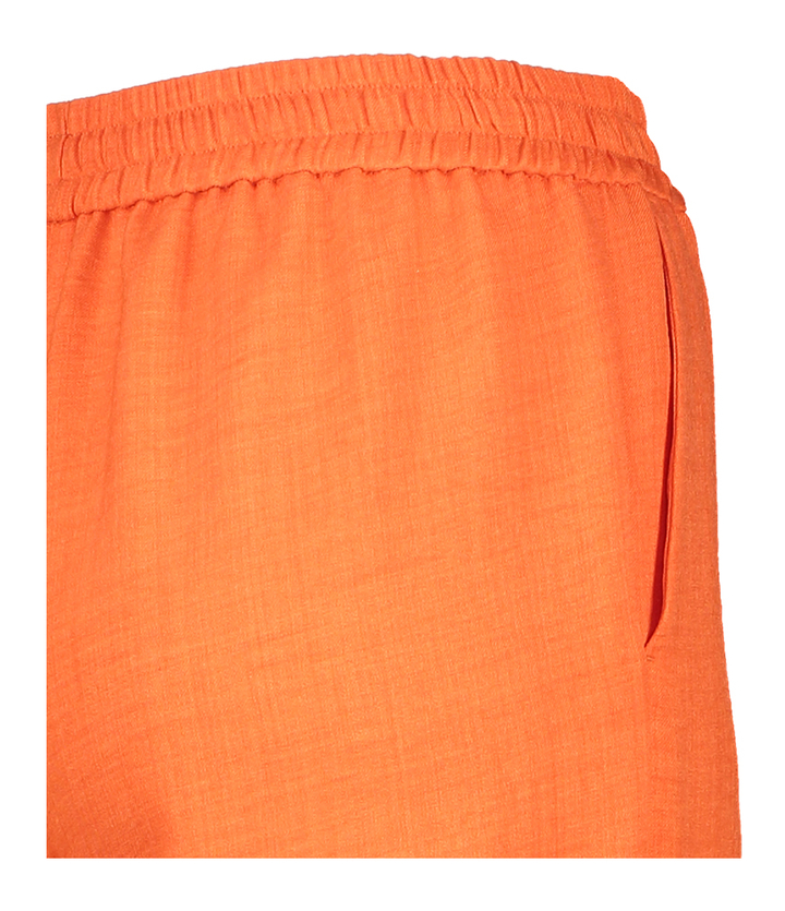 Oranje broek met plooi vooraan Her