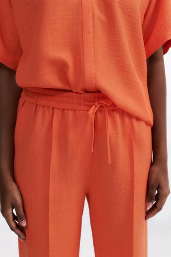 Oranje broek met plooi vooraan Her