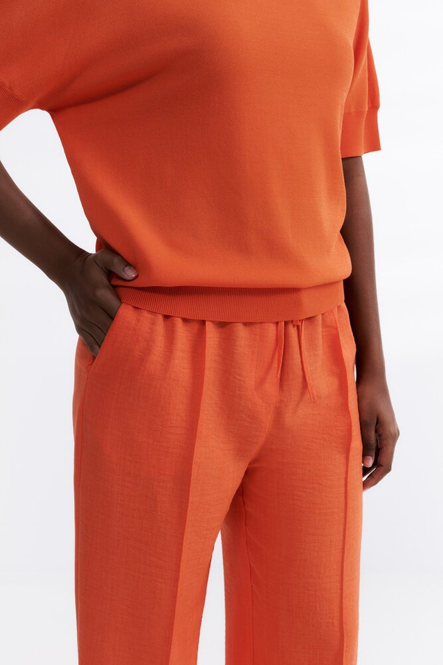 Oranje broek met plooi vooraan Her