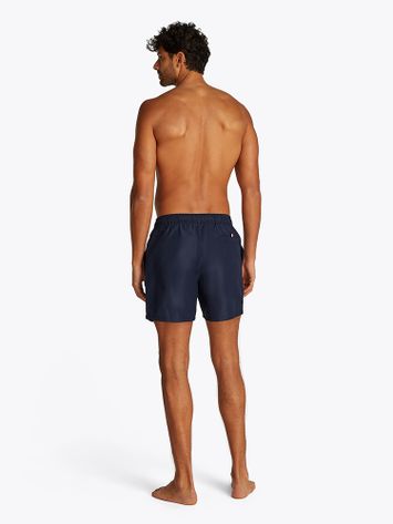 Donkerblauwe zwemshort met merknaam Tommy Hilfiger 