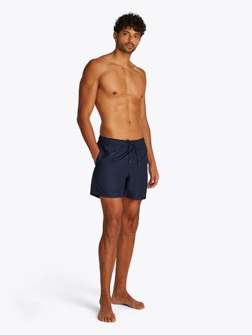 Donkerblauwe zwemshort met merknaam Tommy Hilfiger 
