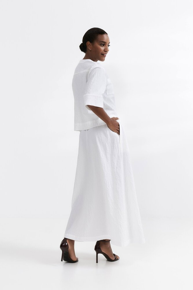 Ecru bloes met knopen en opgestikte zakken HER