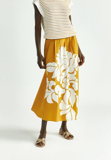 Okergele plooirok met witte bloemenprint Rila Xandres 
