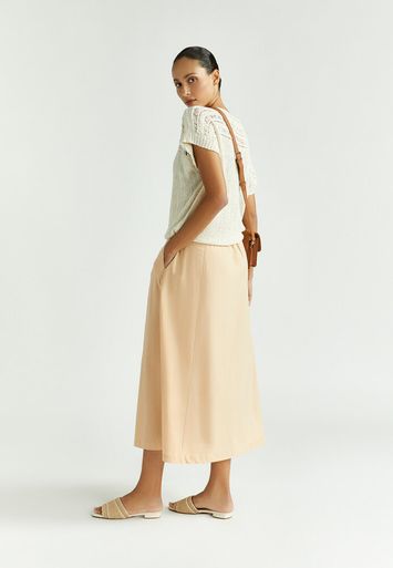 Beige halflange rok met knopen Rayka Xandres 