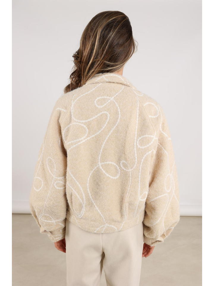 Beige jas met motief Milou Nukus
