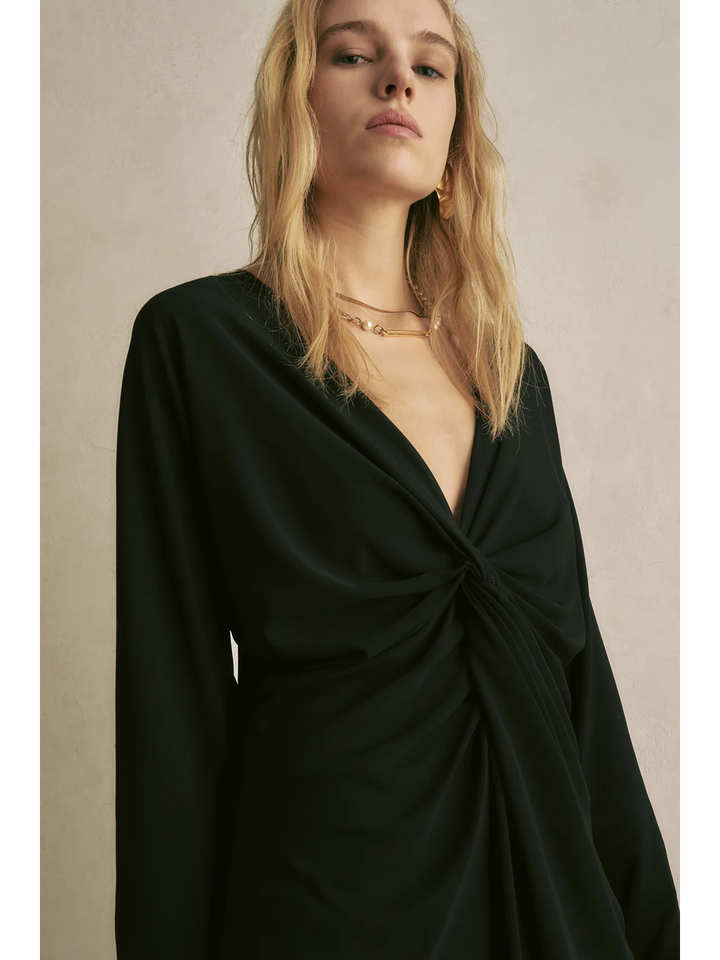 Zwarte feestelijke bloes met knoop aan de borst Semicouture