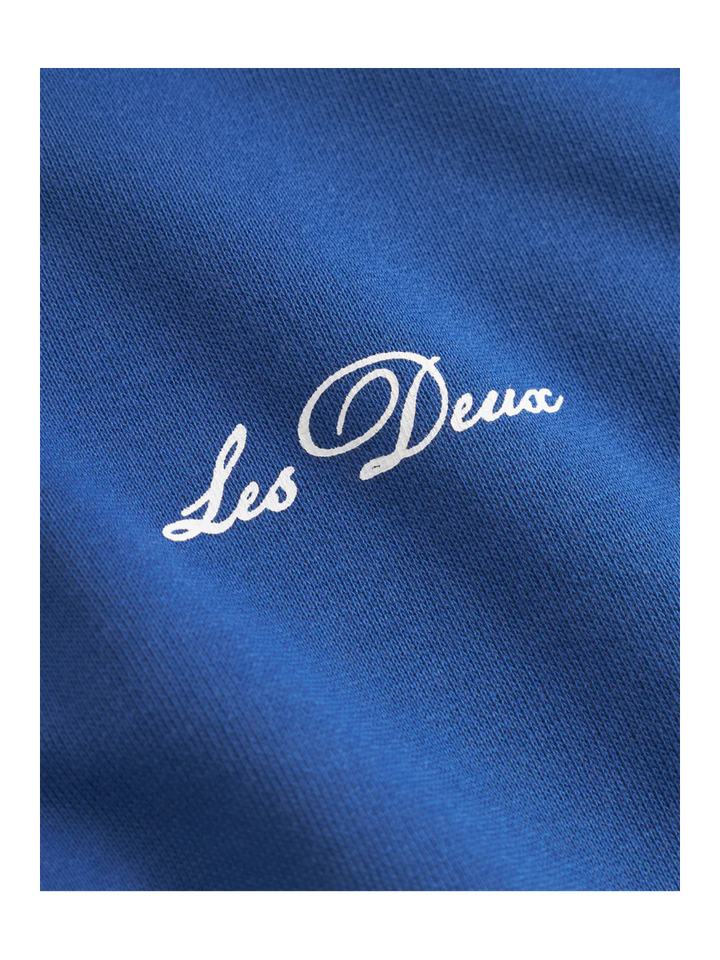 Blauwe sweater met korte rits en opdruk op de achterkant Les Deux 