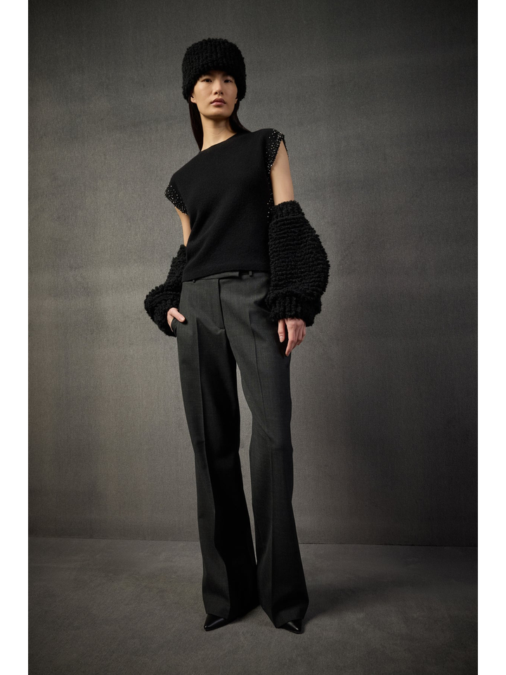 Zwart mouwloze trui met details aan de zijkanten Liviana Conti 