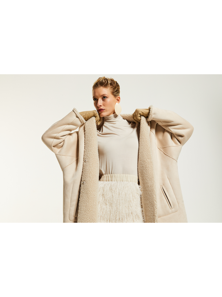 Beige lange mantel met teddy stof Mont Betta Corradi 