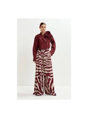 Gebroken witte en bordeaux zebraprint broek met brede broekspijpen Iwide Essentiel