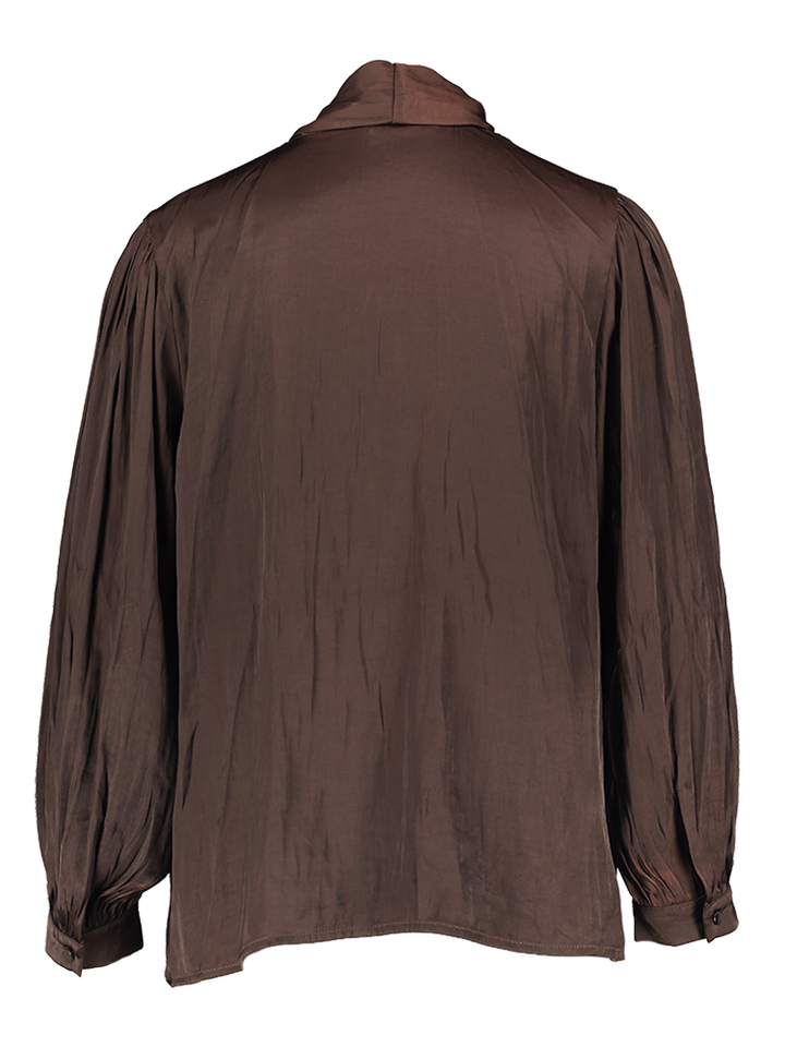 Donkerbruine bloes met strik aande hals Halima Senso