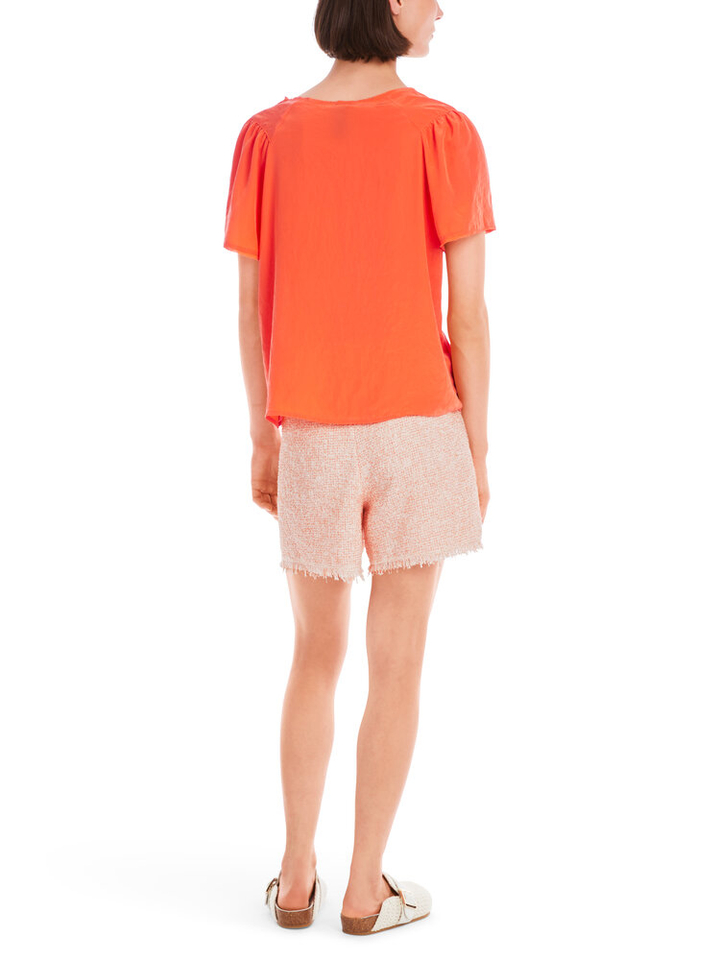 Oranje soepelvallende bloes Marccain Sport 