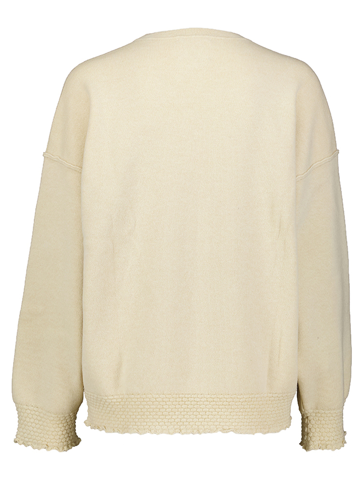 Beige wollen trui met speciale boord Dump Molli
