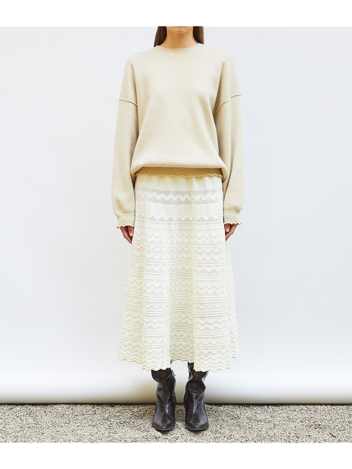 Beige wollen trui met speciale boord Dump Molli