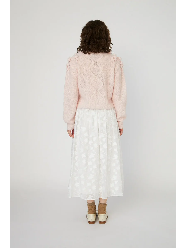 Roze gebreide wollen trui met pompons Stella Nova