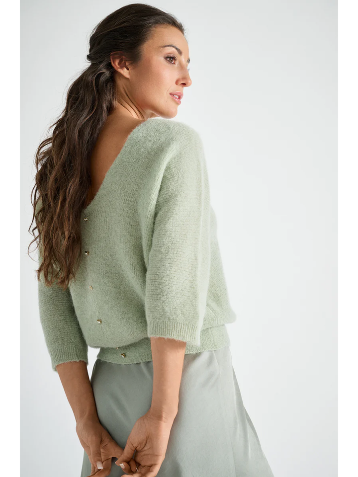 Muntgroene pull met ronde hals vooraan en V-hals achteraan Marie Mero