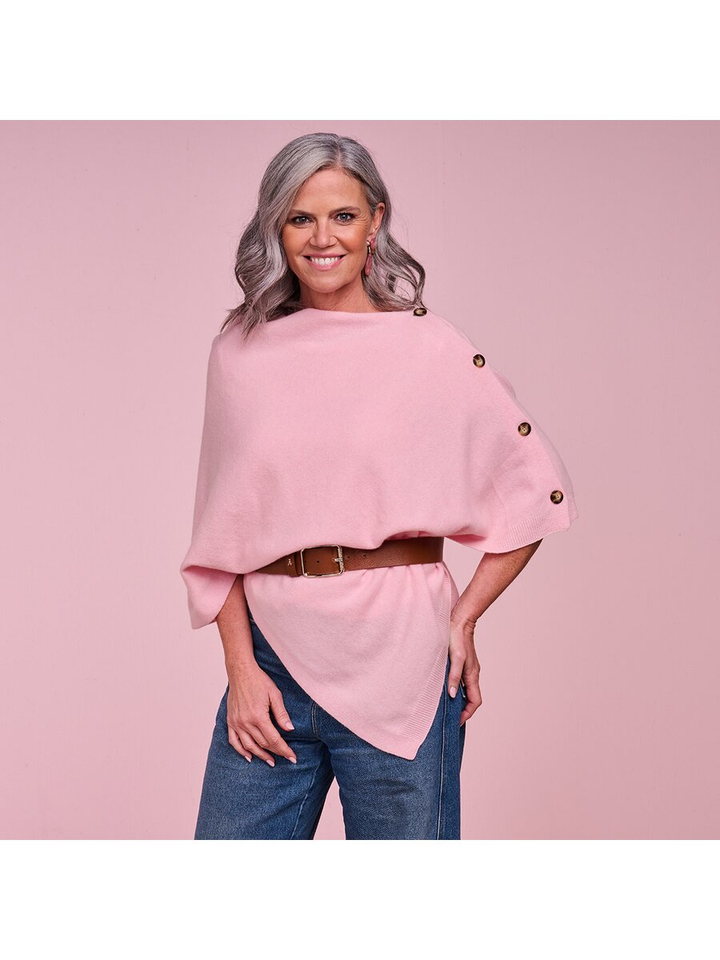 Roze poncho met knopen Les Cordes