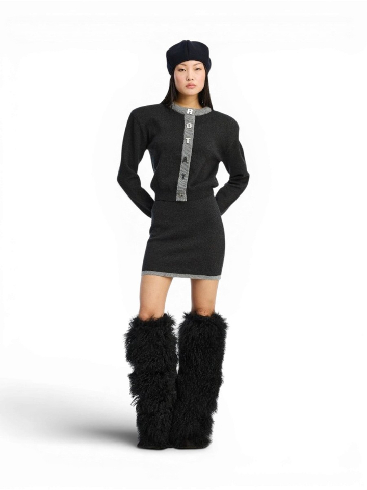 Blauwe gilet met zilveren letters Rotate