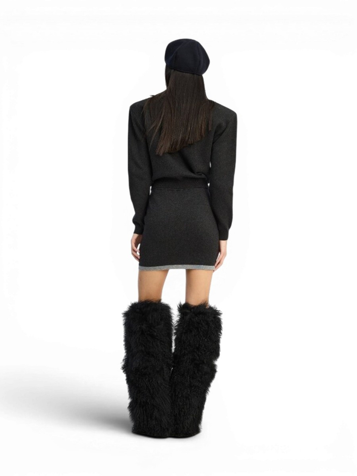 Blauwe gilet met zilveren letters Rotate