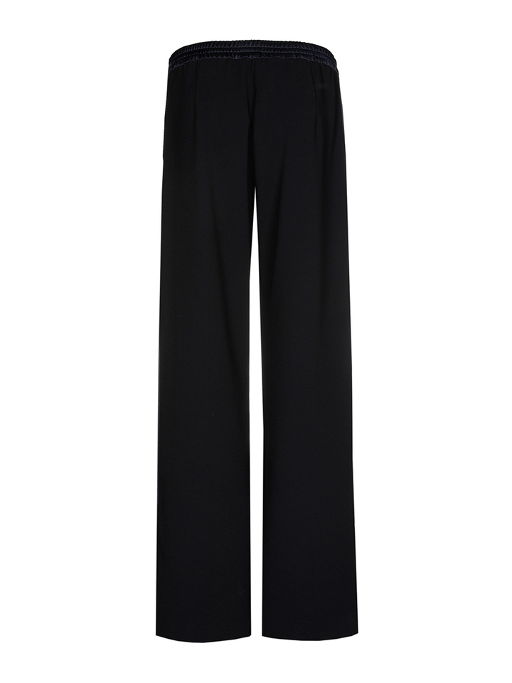 Donkerblauwe glanzende losvallende broek Phocas Xandres