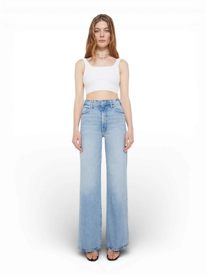 Blauwe flared jeans The Hustler Roller Sneak Mother 