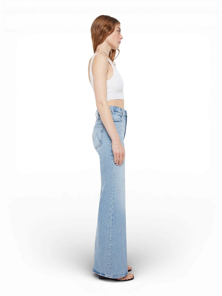 Blauwe flared jeans The Hustler Roller Sneak Mother 