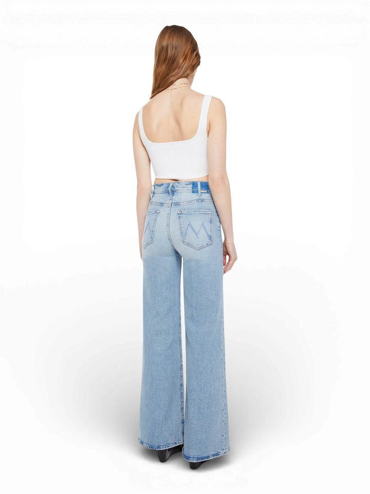 Blauwe flared jeans The Hustler Roller Sneak Mother 